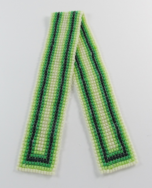 Glass beaded bookmark with varying 
shades of green