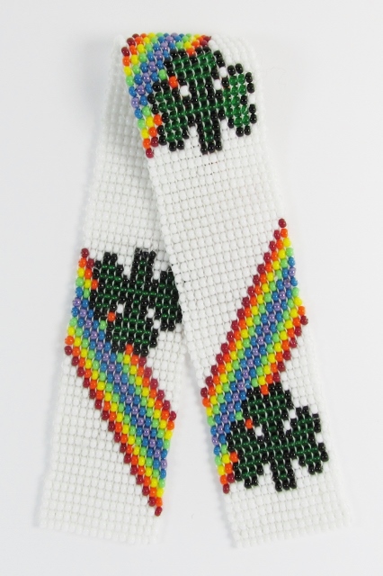 White glass beaded bookmark 
with green shamrocks and rainbows design