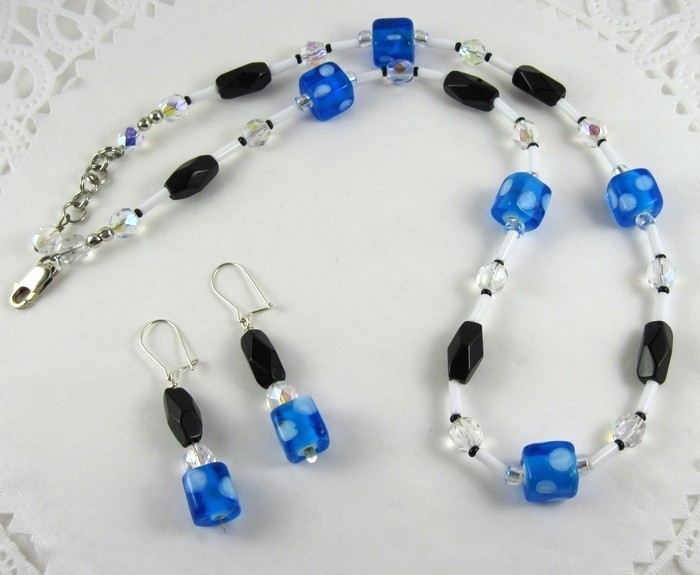Black, 
Clear and White beaded necklace and earrings