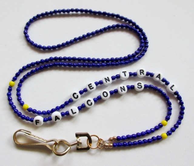 Blue and Yellow 
Badge Holder Necklace with Letters Spelling Central Falcons