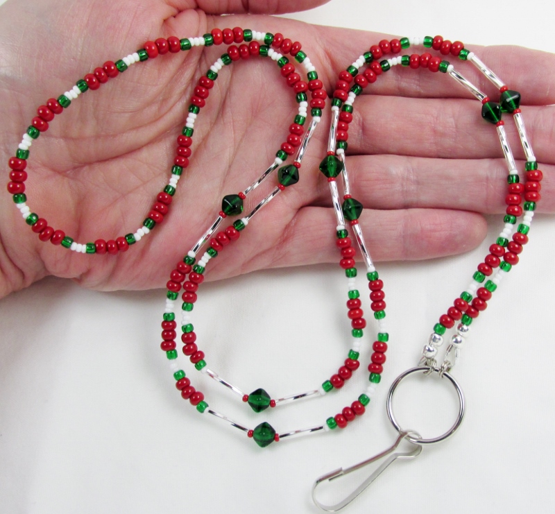 Multi colored Christmas badge holder necklace with green glass bicone beads