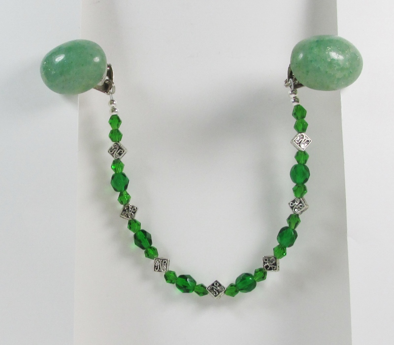 Green sweater guard 
clip with Celtic beads