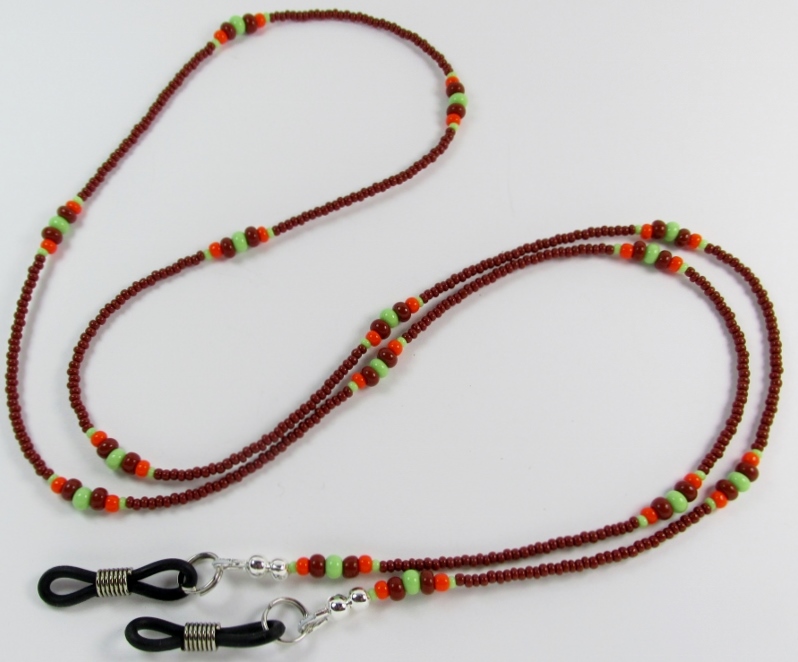 Brown, 
orange and green glass-beaded eyeglass necklace