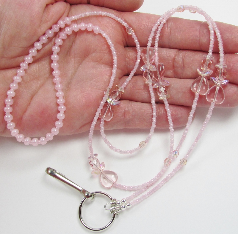 Pink 
glass beaded lanyard with pink glass angels